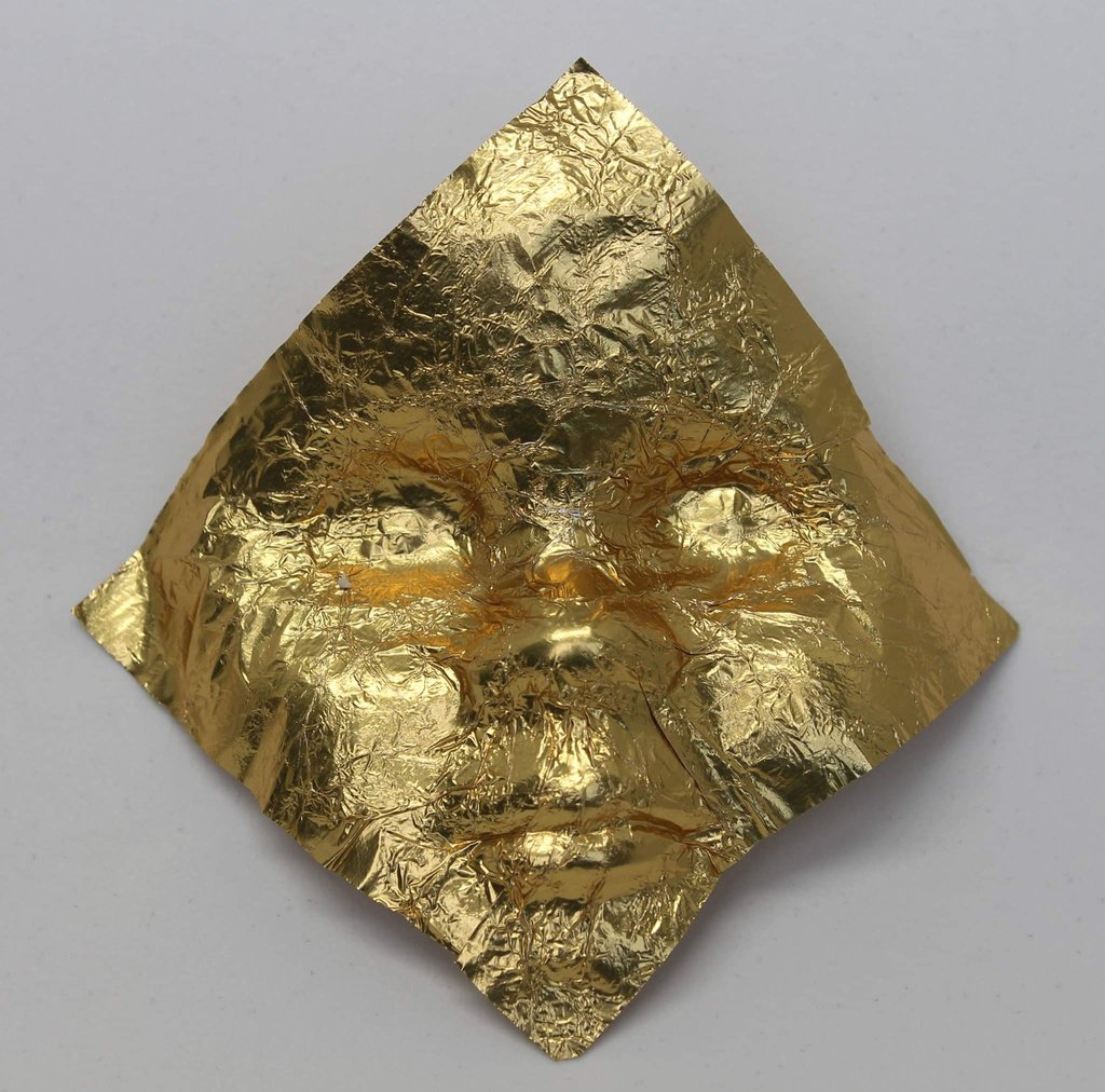 Detail from Cover-Discover Installation, Golden foil paper by Dana Bloom